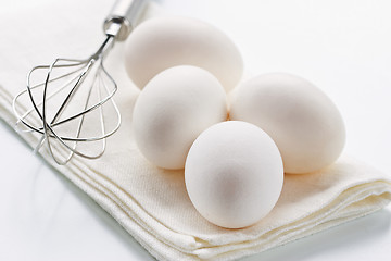 Image showing Eggs with whisk 