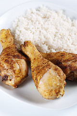 Image showing Roasted chicken legs with boiled rice