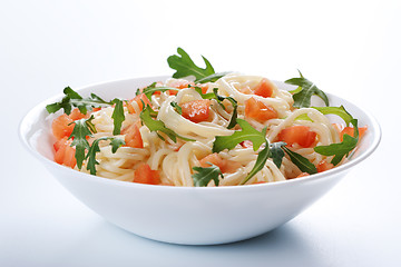 Image showing Pasta with tomato and rucola