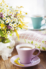 Image showing Tea and wildflowers