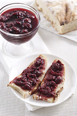 Image showing Cherry jam on toast
