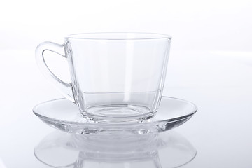 Image showing Transparent glass cup and saucer