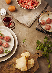 Image showing Meatballs cooking