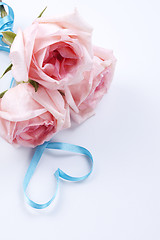 Image showing Bouquet of roses with ribbon in heart shape