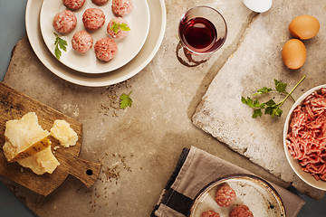 Image showing Meatballs cooking