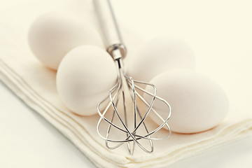 Image showing Eggs with whisk 
