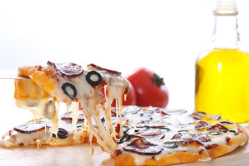 Image showing Pizza with melted cheese