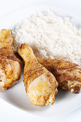 Image showing Roasted chicken legs with boiled rice