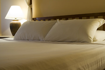 Image showing King sized bed in a hotel suite room


