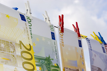 Image showing Euros on a clothesline