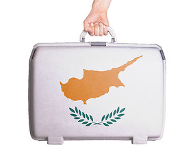 Image showing Used plastic suitcase with stains and scratches