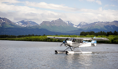 Image showing Single Prop Airplane Pontoon PLane Water Landing Alaska Last Fro