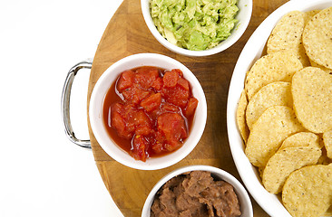 Image showing Food Appetizers Chips Salsa Refried Beans Guacamole Wood Cutting