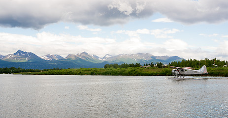 Image showing Single Prop Airplane Pontoon Plane Water Landing Alaska Last Fro