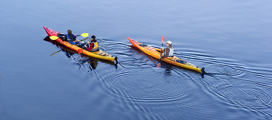 Image showing Family Unit Boating Paddles Down Calm River Kayak Outing