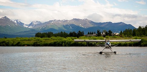 Image showing Single Prop Airplane Pontoon Plane Water Landing Alaska Last Fro