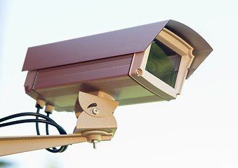 Image showing Enclosed Professional Security Video Camera Mounted Outside Home