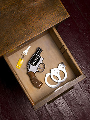 Image showing 38 Revolver in Desk Drawer with Handcuffs 