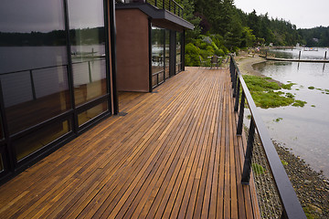 Image showing Wood Plank Deck Patio Beach Water Contemporary Waterfront Home
