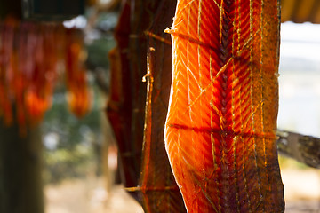 Image showing King Salmon Fish Meat Catch Hanging Native American Lodge Drying