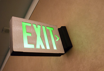 Image showing Wall Mounted Exit Sign Shows People Way Out Public Building