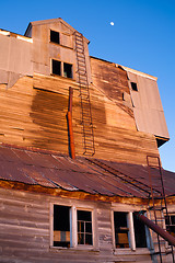 Image showing Unique Shape Farm Barn Building Full Moon Country Night