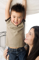 Image showing Mother and Son Bond Laughing Celebrating Close Ties Love Family