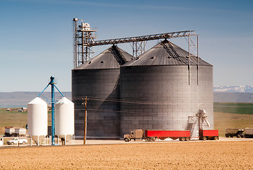 Image showing Agricultural Silo Loads Semi Truck With Farm Grown Food Grain