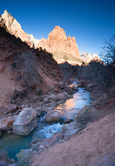 Image showing River Flows Sunrise Glow Rocky Butte Zion National Park