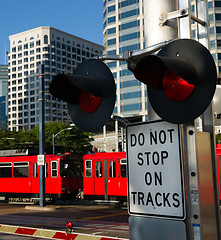 Image showing Stop Warning Signal Metro Transit Railroad Tracks Red Trolley Ca