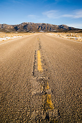 Image showing Blue Sky Worn Mountain Road Desert Travel Asphalt