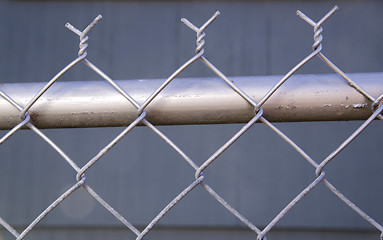 Image showing Backyard Re-Painted Metal Chain Link Fence Top Post Wire