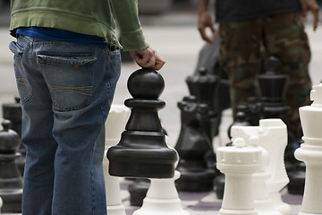 Image showing Man Moves Piece People Playing Giant Chess Game Sidewalk Downtow