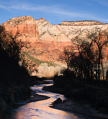 Image showing River Flows Sunrise Glow Rocky Butte Zion National Park