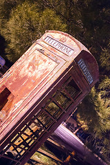 Image showing Skewed Vintage Obsolete Outdoor Telephone Booth Southwest Rural 