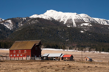 Image showing Red Barn Endures Mountain Winter Wallowa Whitman National Forest