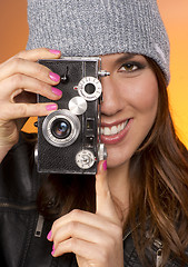 Image showing Woman Looks Right at the Camera taking a picture too