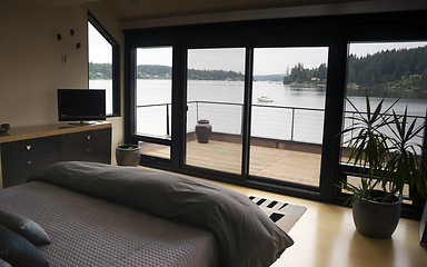 Image showing Home Interior Bedroom Sliding Glass Doors Deck Harbor Boat Nauti