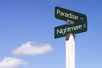 Image showing Paradise Nightmare Signs Crossroads Street Avenue Sign Blue Skie