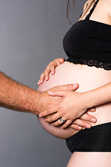 Image showing Man Woman Partners Expecting Baby Both Touch Hands Pregnant Stom