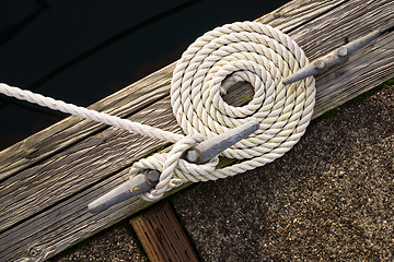 Image showing Beautiful Swirled Curled Rope Boat Bow Line Nautical Tie Down