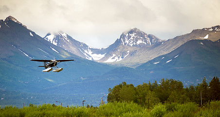 Image showing Single Prop Airplane Pontoon Plane Water Landing Alaska Last Fro