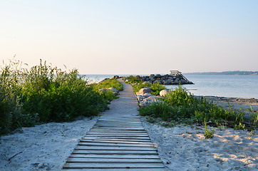 Image showing Wooden footpath at the beach 