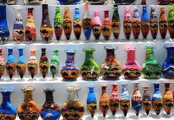 Image showing Bottles with sand picture