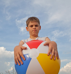 Image showing Young boy with beach ball