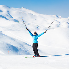 Image showing Excited woman skier.