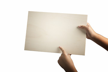 Image showing Plywood sign held up by young hands