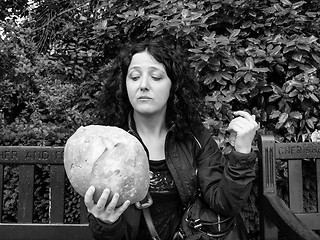 Image showing Girl eating bread