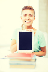 Image showing smiling student girl with tablet pc