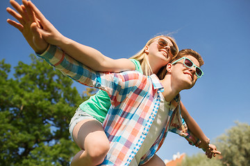 Image showing smiling couple having fun in park